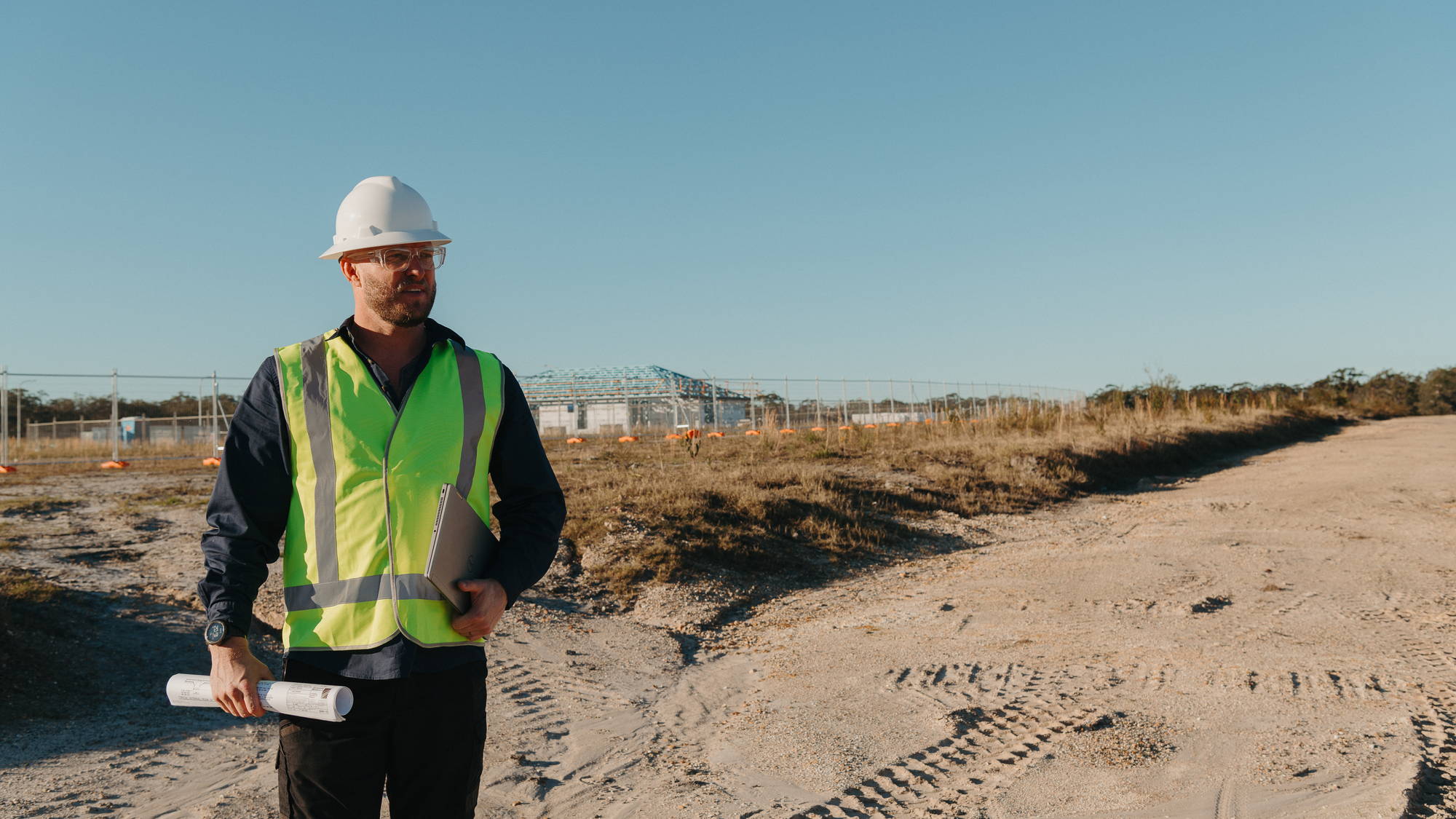 Toby McCosker supervising works on a construction site